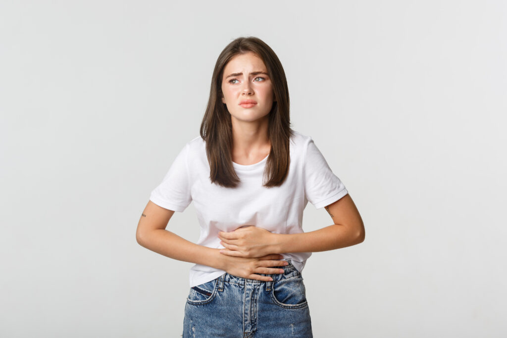 Bloated stomach and feeling sick and tired female