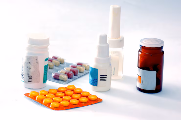 Prescription medications displayed in professional pharmacy packaging on a clean medical background